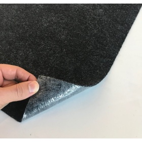 Product image of the back of the SmartGrip Mat roll which has a tacki-back adhesive system keeping mats flat and in place