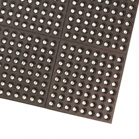 Corner product image of the 24/seven Inetrlocking Rubber Mat - Holes from Mat World is an all-purpose mat that drains falling liquids. 