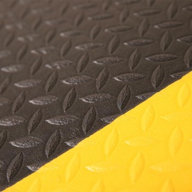 Close up image of the moulded in yellow borders, featuring bevelled edges that add an additional safety layer