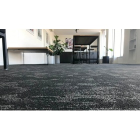 Insitu image of Bolyu Carpet Tiles in a waitng room, which are long lasting and has been created with odour reducing technology.
