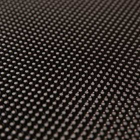 Superclose up of the Multiguard Mats beveled edging and flexible rubber ringers that scrape shoes and trap dirt.