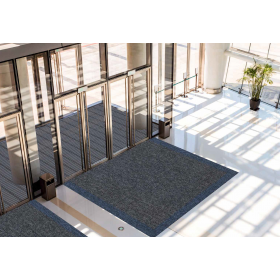 Insitu image of the Foris Entry Matting in an entrance way, can be made to measre and superior to fine dirt and moisture removal. 