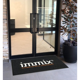 Insitu product image of the Superguard Inlay Logo Mat in a retail space.
