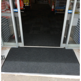 Image of the superguard entrance mat being used as a commerical entrance mat.