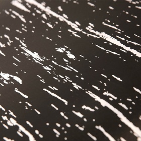 Close up image of the marble-like black and white design used in banks for bank tellers